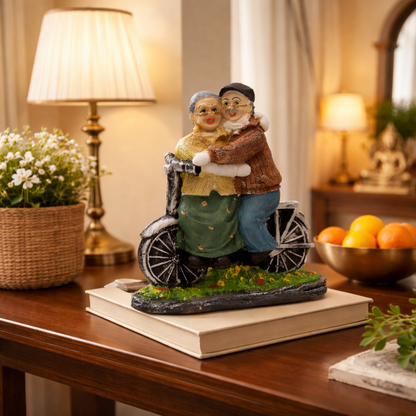 Dada-Dadi Romantic Couple Miniature Grandparents on Cycle Statue Showpiece
